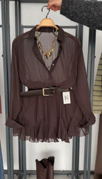 FILE - VESTIDO