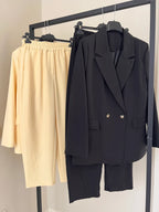 DONA - TRAJE